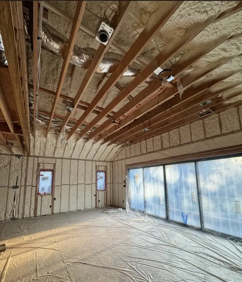 Interior walls and ceiling insulated with spray foam during new construction in Union City